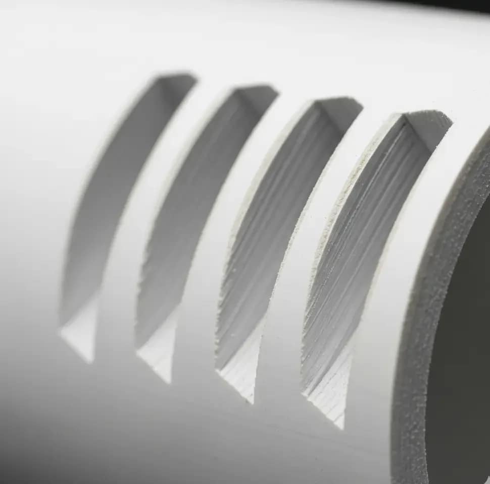 DIY Vertical Hydroponic Tower Under $60: The Leak-Proof Blueprint 1 Close-up of 4-inch PVC pipe with sanded 45-degree holes for a vertical hydroponic tower.