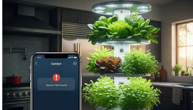 A visual review of the Gardyn smart garden, showcasing a successful crop of plants in contrast with a glitching app on a smartphone.